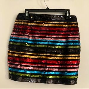 Black, rainbow sequined, mini skirt. Size medium. Express.